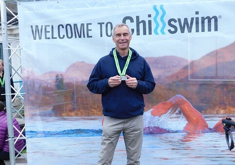 Malcolm Underhill swims Lake Conniston