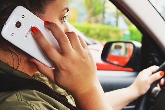 using a mobile phone while driving offence
